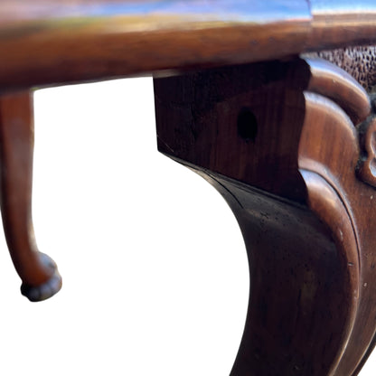 Antique style mahogany stool with hand-carved scrollwork to the apron