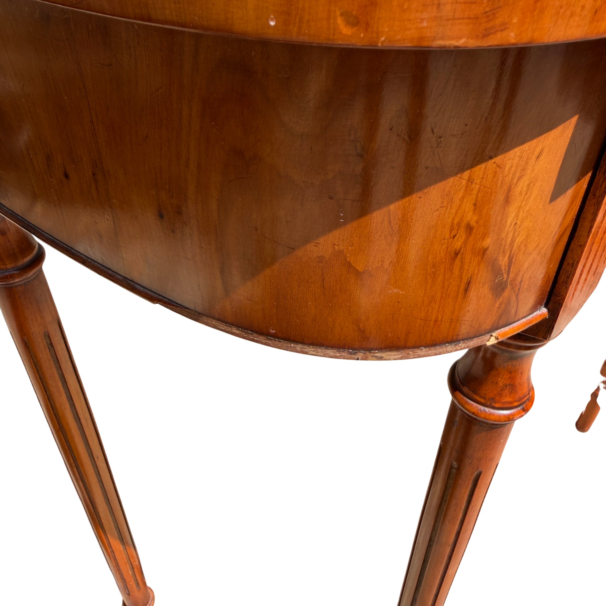 Top-down view of burr-veneer surface on vintage hall table