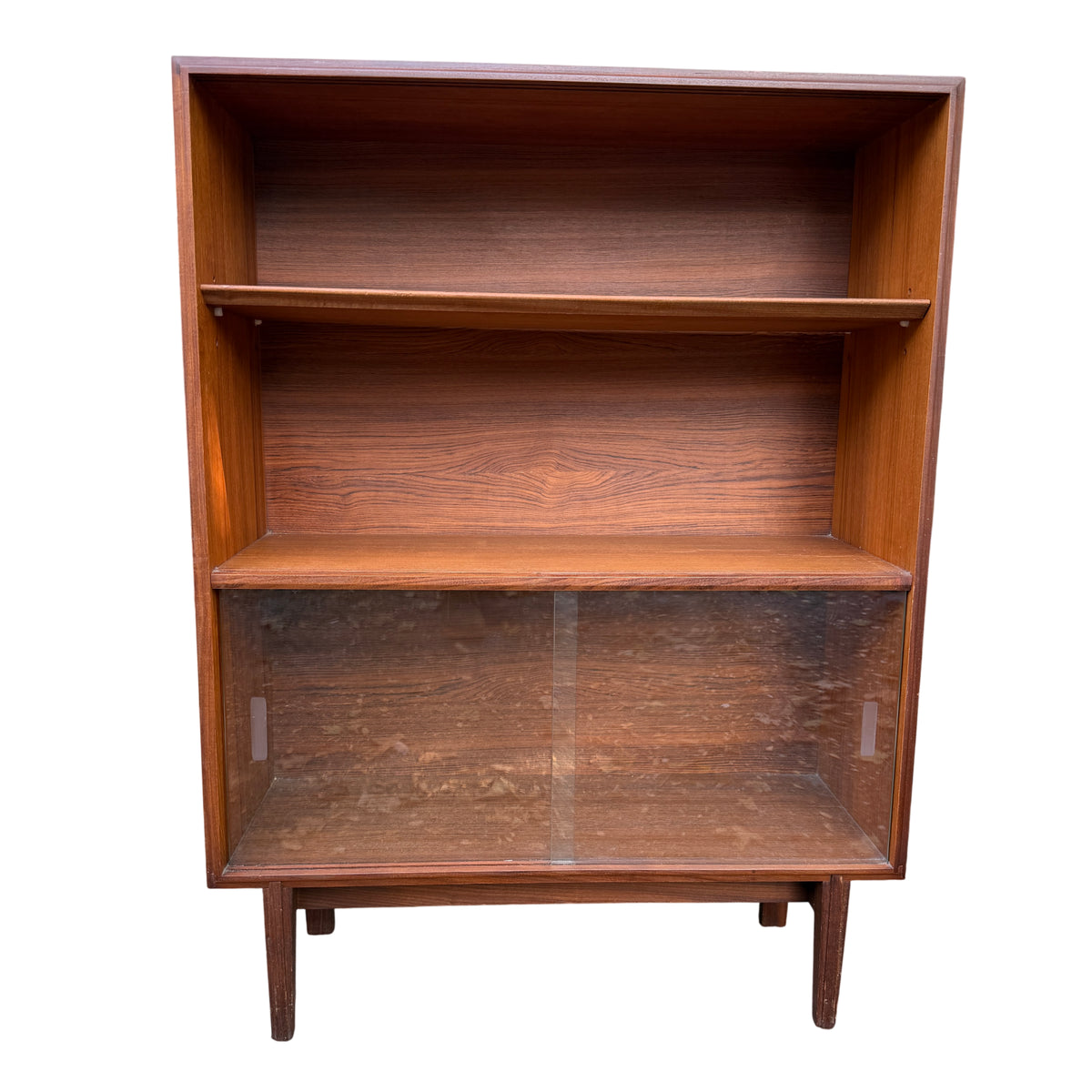 Vintage teak bookcase with sliding glass doors and raised legs