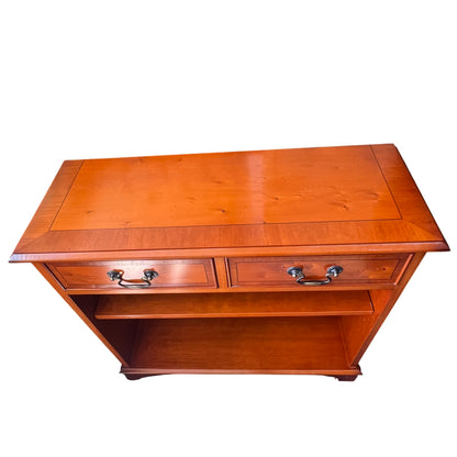 Compact pine bookcase with twin top drawers and drop handles
