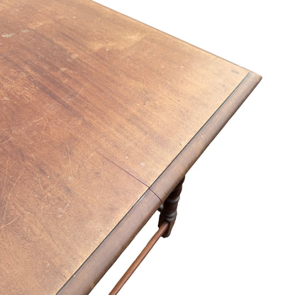 Close-up of surface wear and scratches on the vintage table top edge