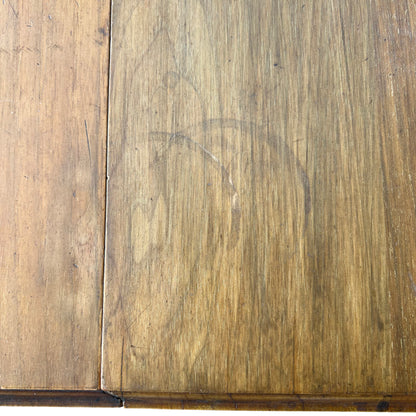 Base and feet of Victorian occasional table with castors and scuffed feet