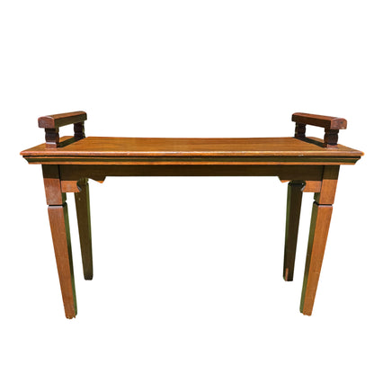 Side view of vintage mahogany serving table showing square tapering legs and shaped corner brackets
