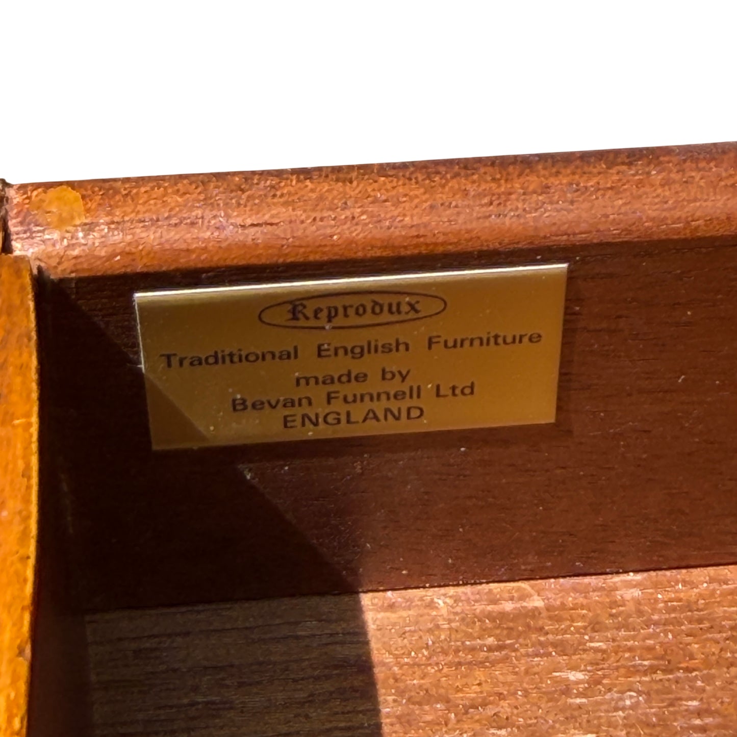 Lower view showing underframing and turned legs of vintage hall table
