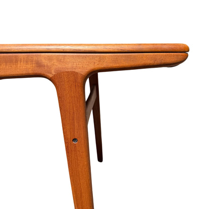 Close-up of teak tabletop edge and corner profile on mid century dining table