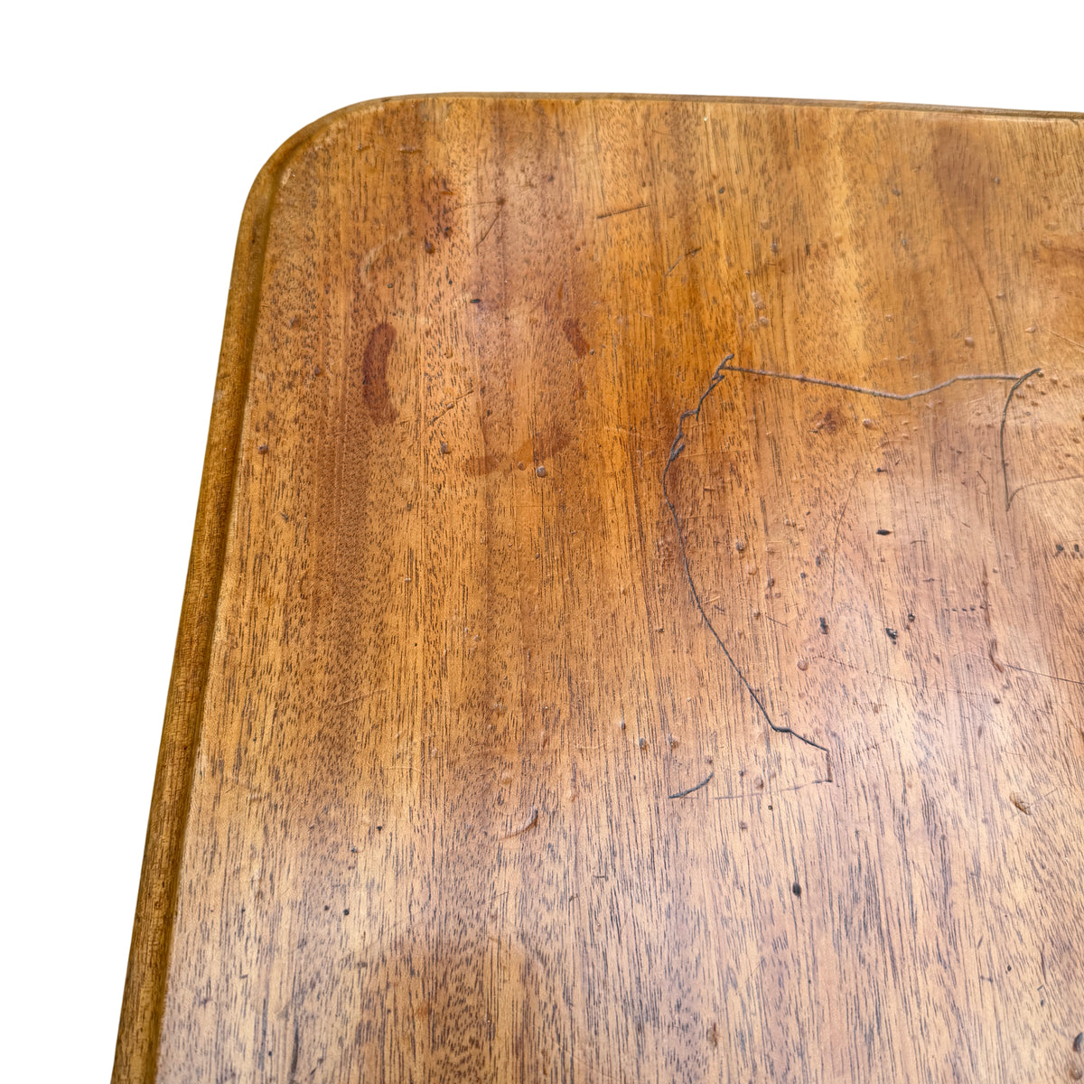 Edge detail of solid wood top with rounded moulding on a vintage dressing table