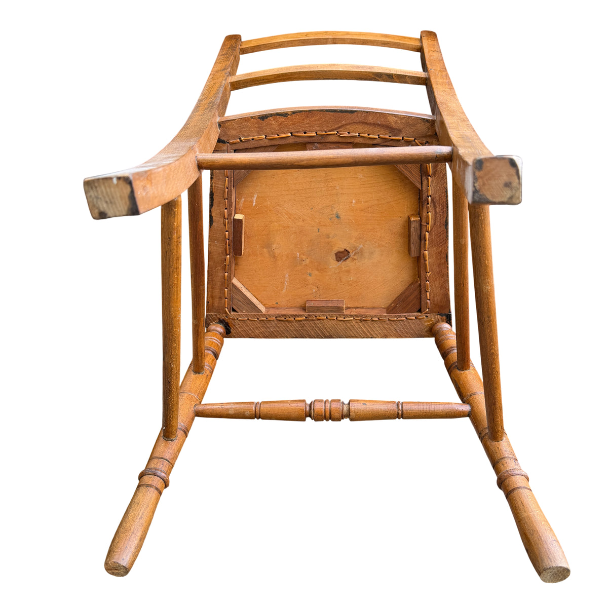 Turned leg detail and stretcher construction on ladderback chair