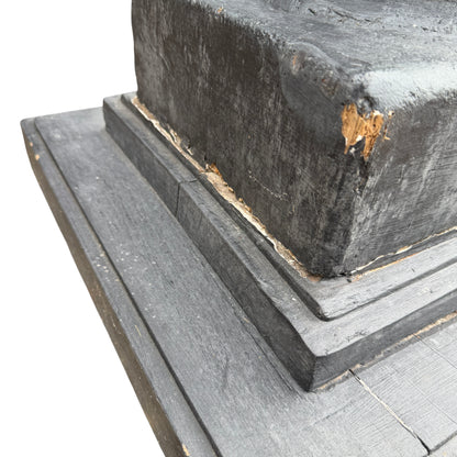 Top of spiral column with square platform suitable for displaying objects