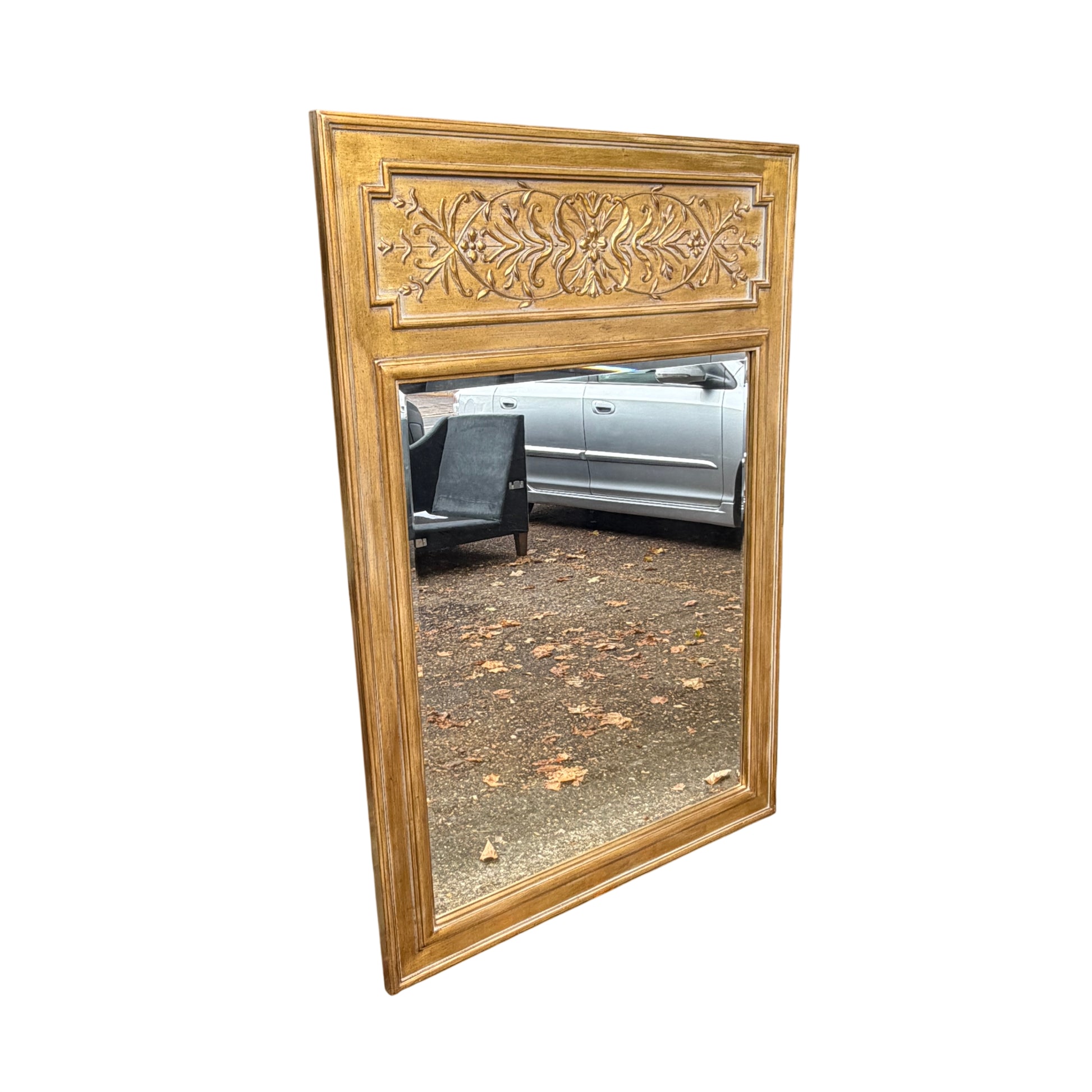Edge detail of gold overmantel mirror showing paint wear and raised moulding