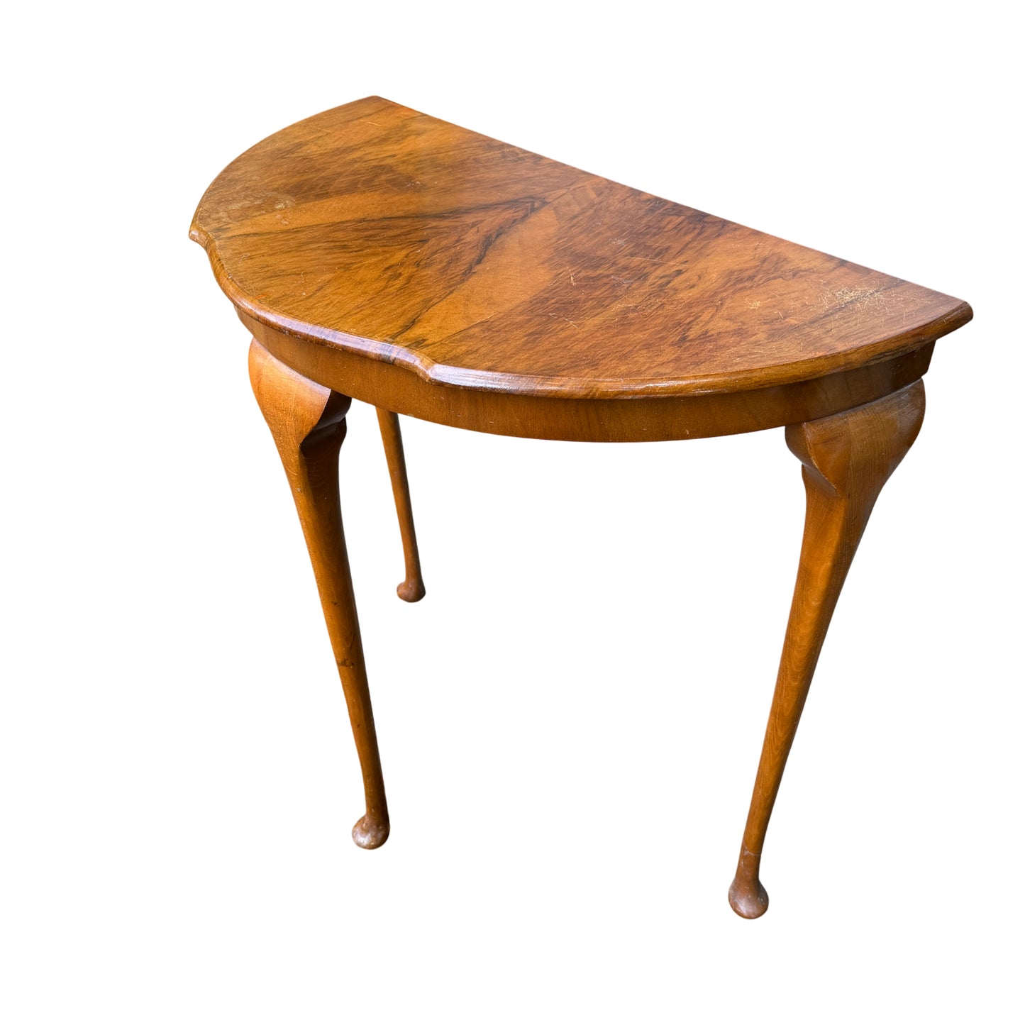 Half moon walnut veneer hall table with cabriole legs and pad feet