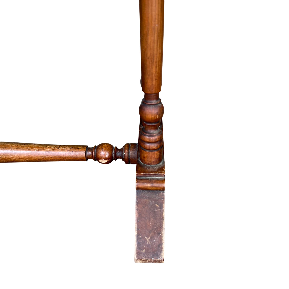 Front view of small oak hall table with turned base and stretcher