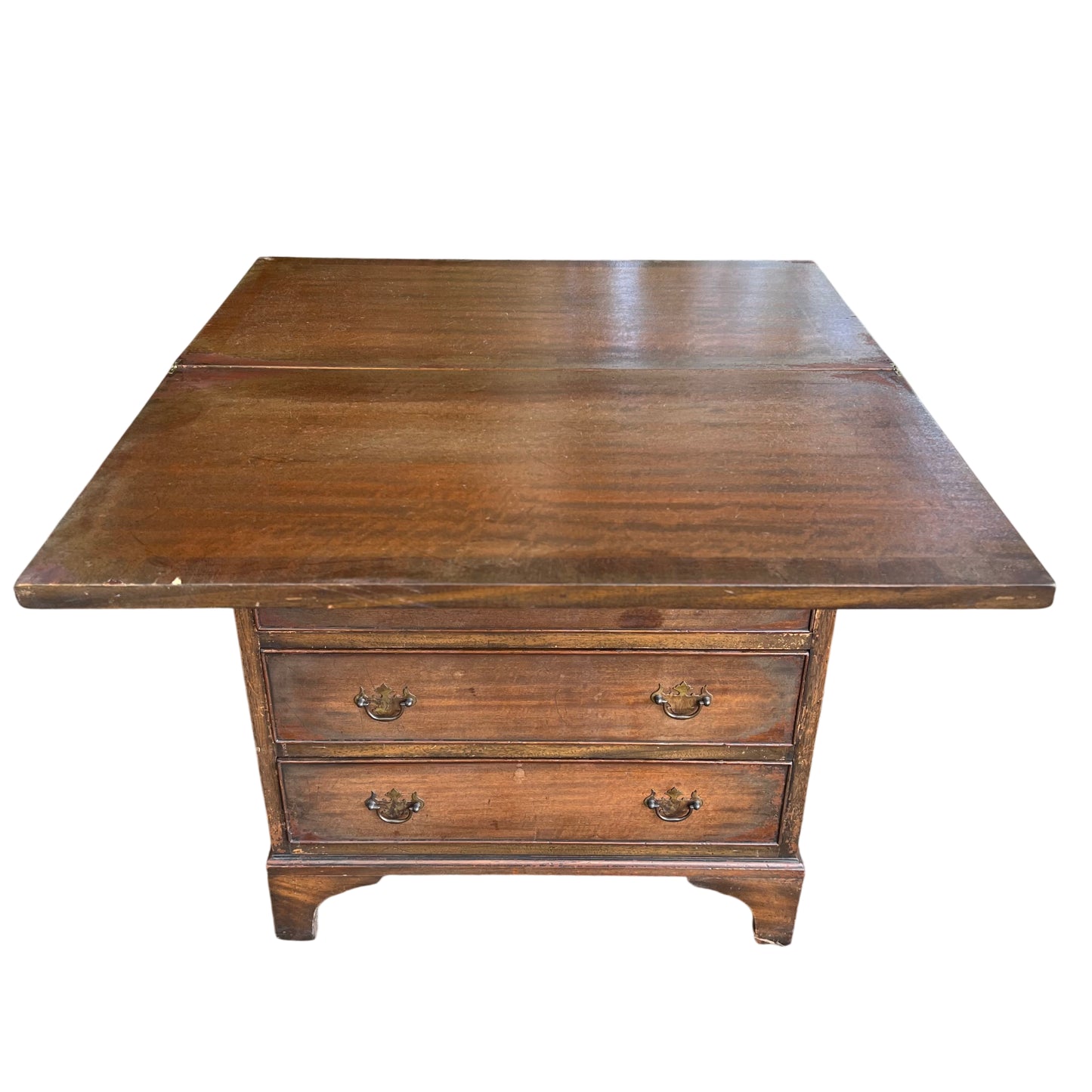 Top corner of oak chest showing edge wear and small repair plates