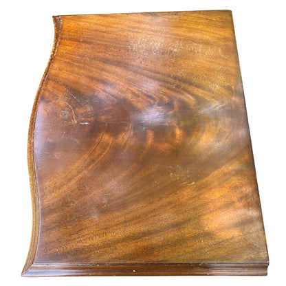 Side view of vintage mahogany bedside chest showing veneered panel