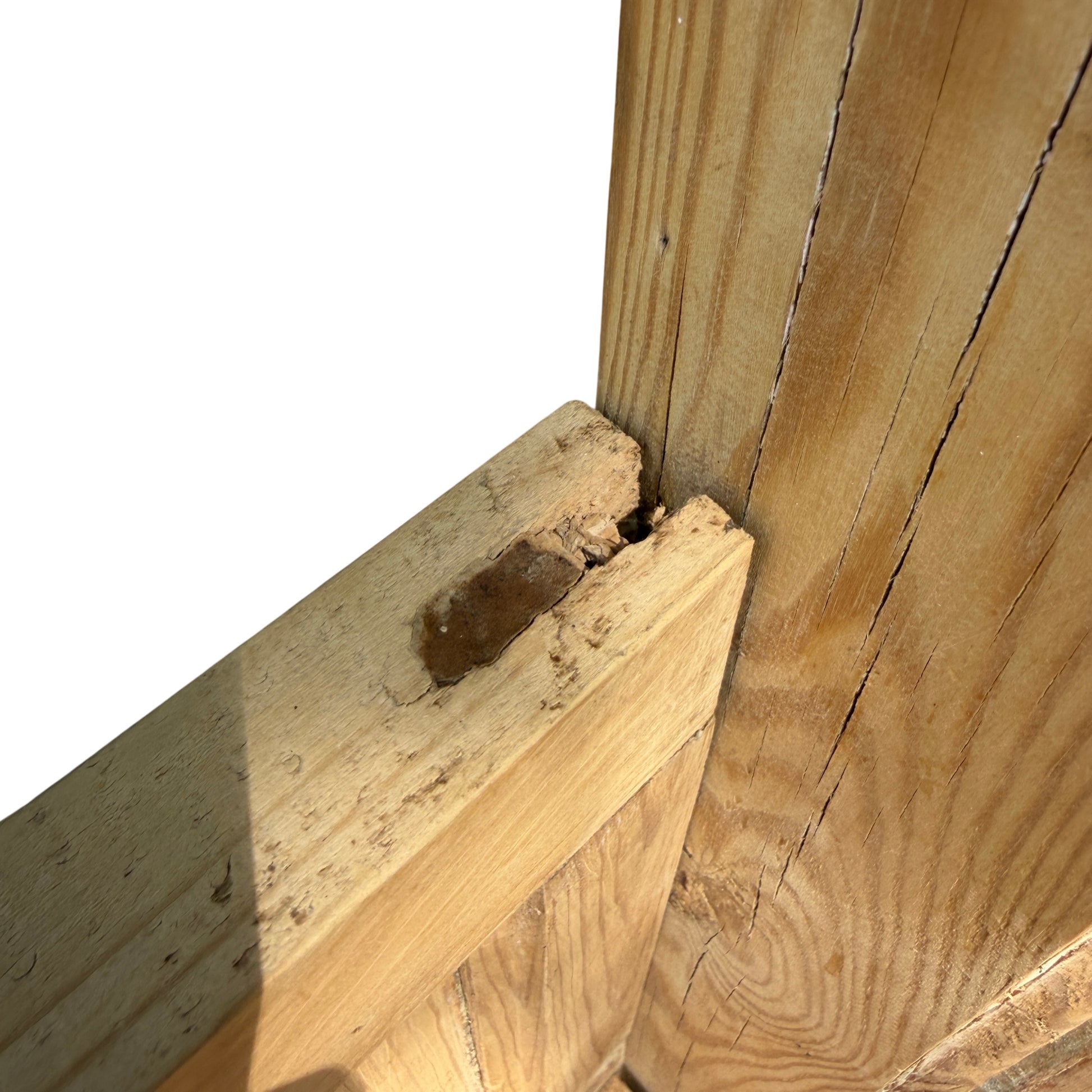 Rustic pine settle with storage showing knots and reclaimed boards