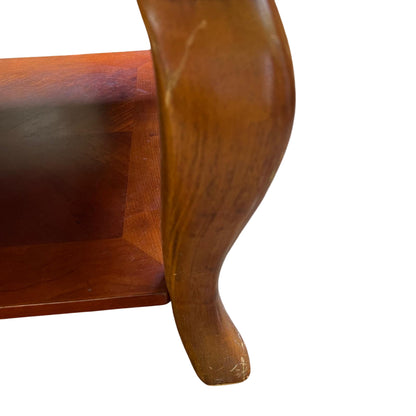 Detail of coffee table top showing wood grain on veneer surface