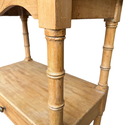 Side profile of Victorian pine bedside cabinet with scrolled gallery sides