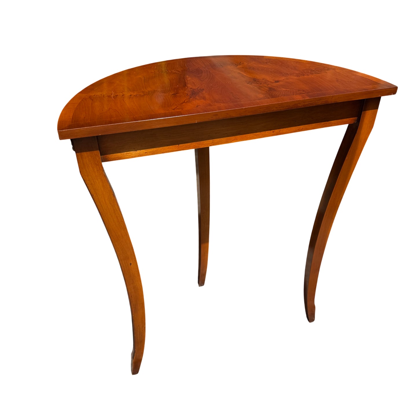 Console table in sunlight outside a shop showing overall shape and finish