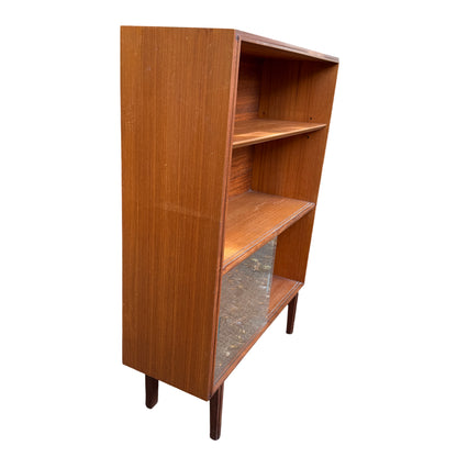 Top view of teak display cabinet showing surface wear and ring marks