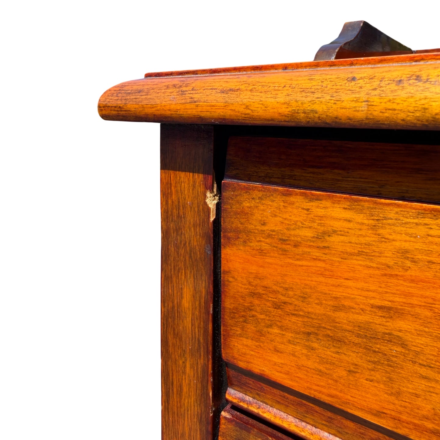 Detail of circular brass ring pull handle on Edwardian chest of drawers