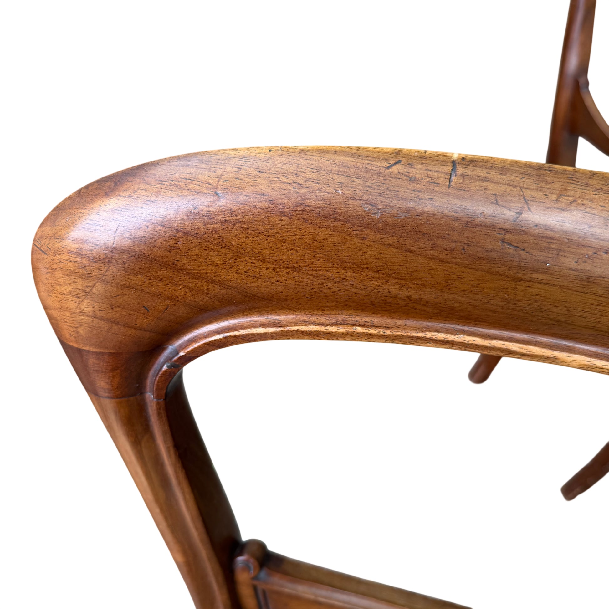 Damaged chair back with broken and missing rear top section requiring repair
