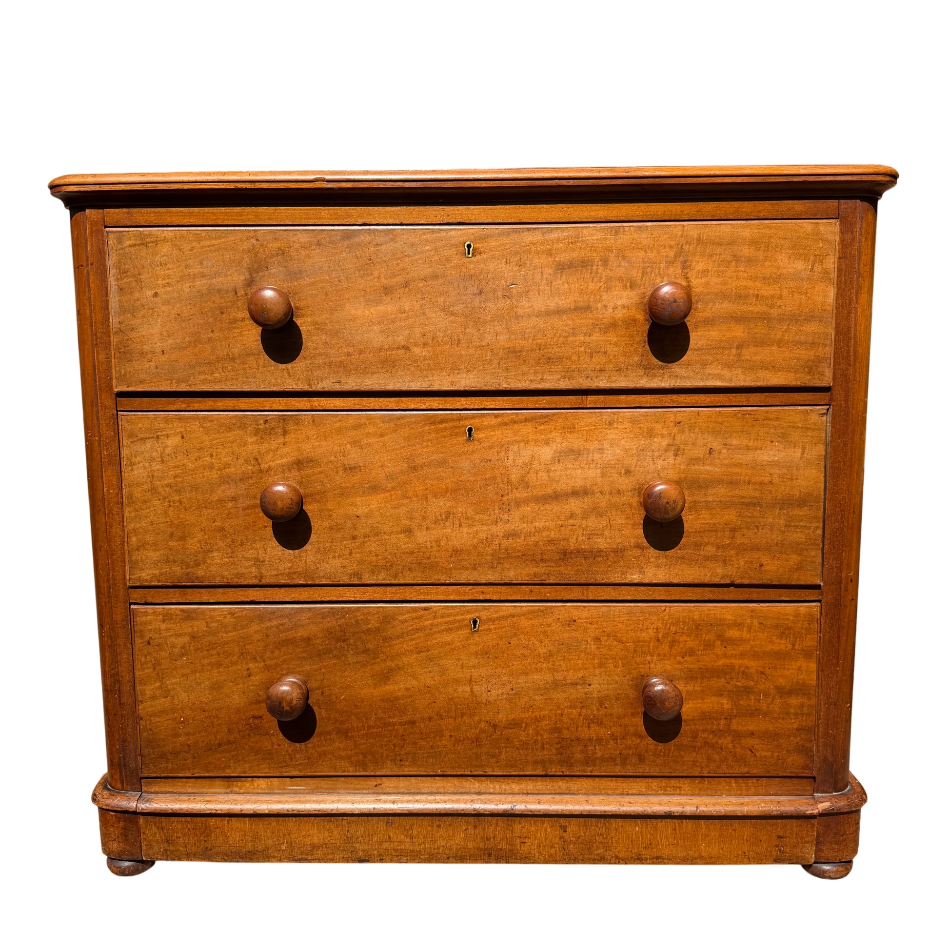 Victorian pine chest of drawers with four long drawers and turned wooden knobs