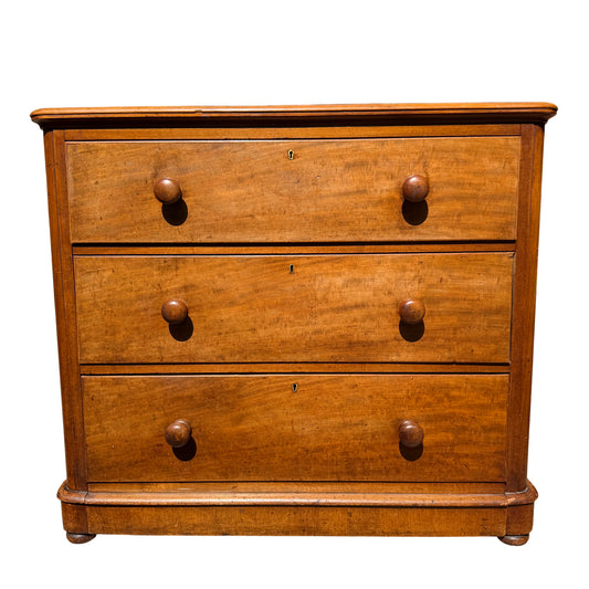 Victorian pine chest of drawers with four long drawers and turned wooden knobs