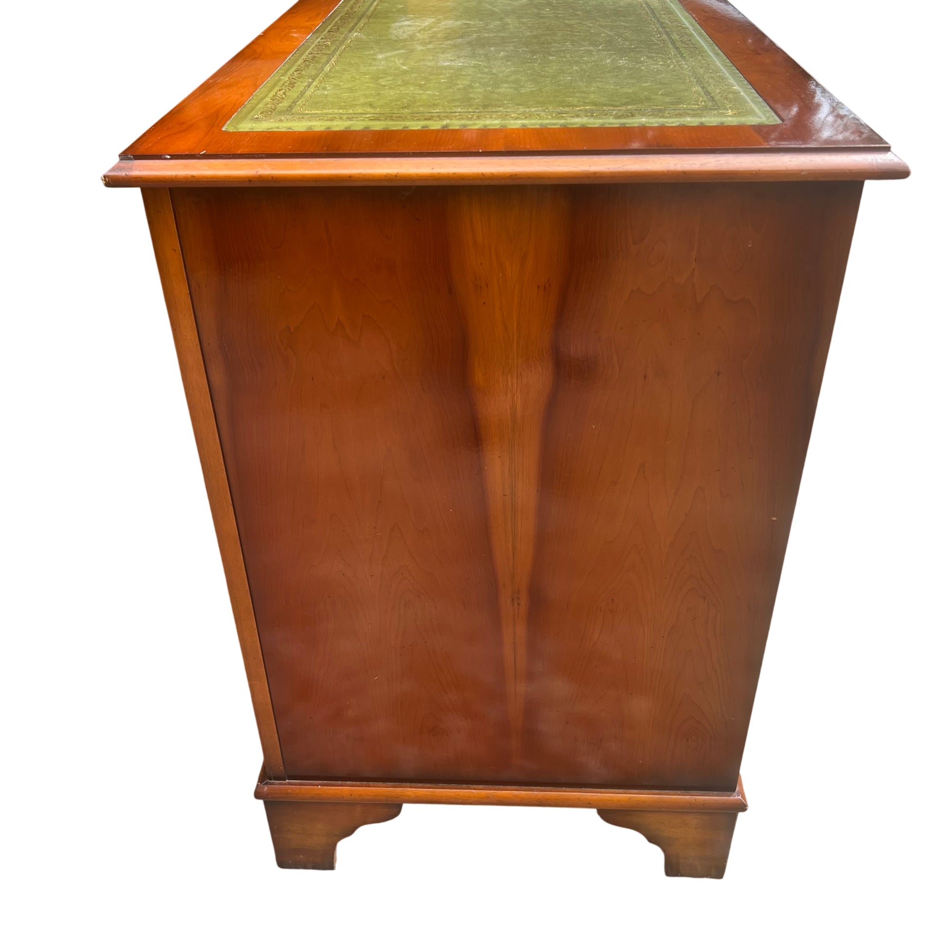 Pair of drawers on a vintage desk with brass-effect handles and wood finish