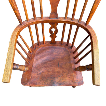 Vintage oak armchair seat and arm showing patina and finish wear
