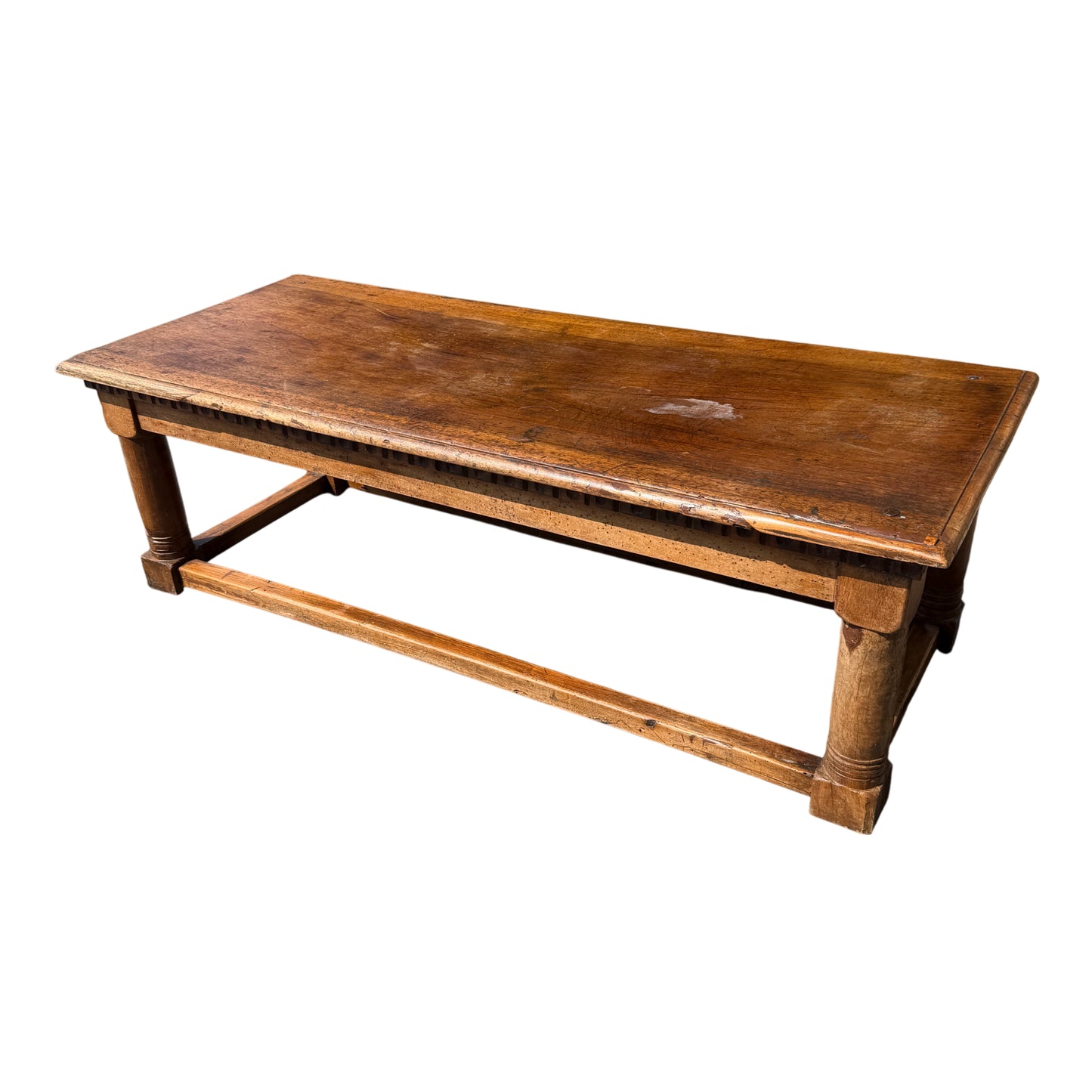 Victorian oak coffee table with rectangular top, turned legs and stretcher base viewed from above