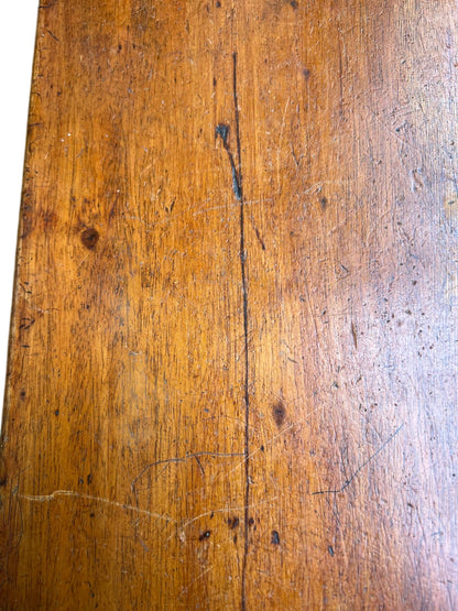 Front view of narrow hall table with turned legs and dark leg finish