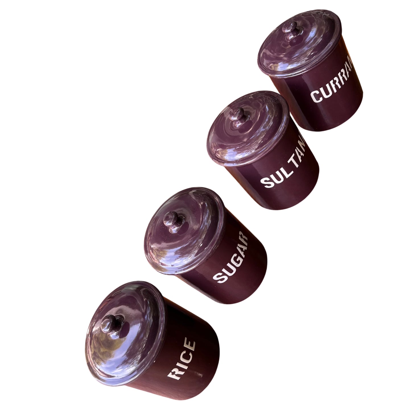 Purple enamel canister labelled Sugar with white lettering close up