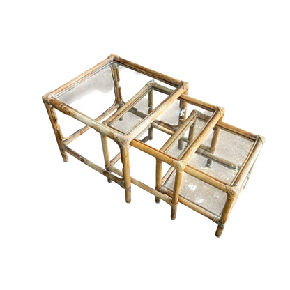 Side view of rattan nest of tables showing corner banding and glass top