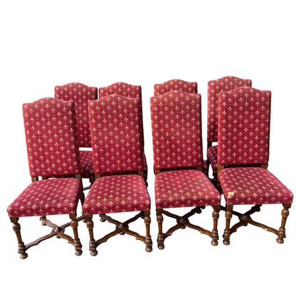 Vintage upholstered dining chair in red fleur de lis fabric with turned wood legs