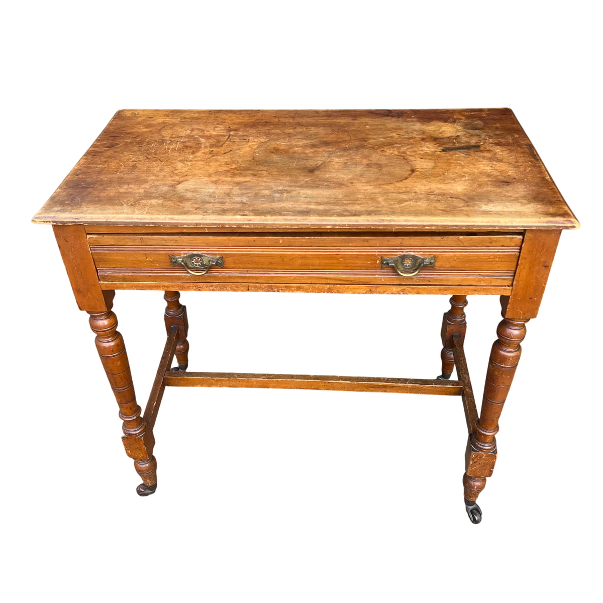 Antique pine side table showing single shallow drawer and moulded drawer front