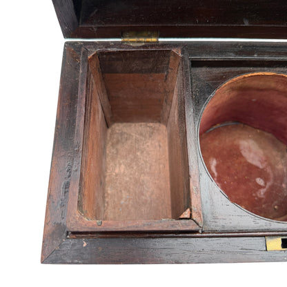 Interior view of tea caddy showing one removable compartment and missing central bowl