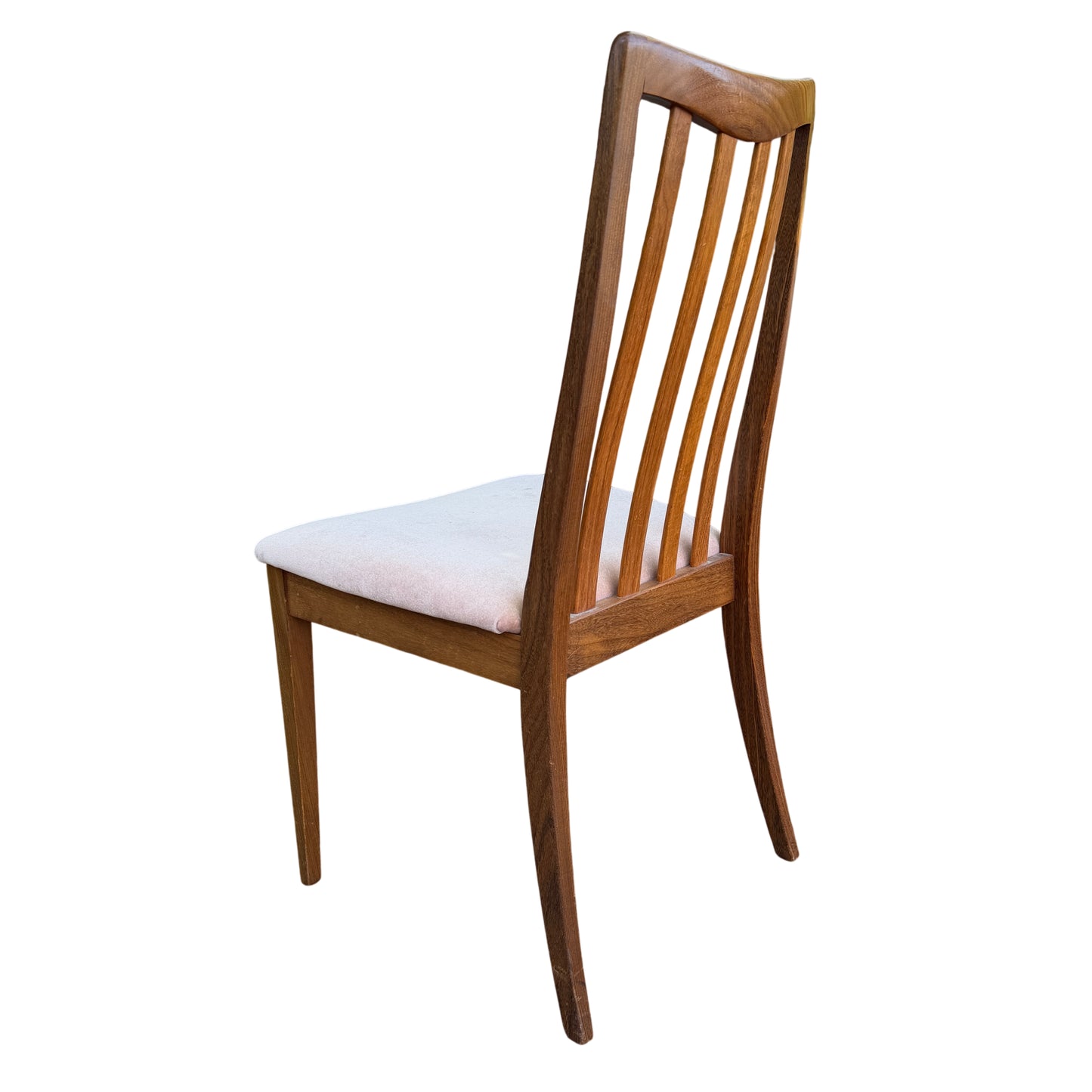 Side view showing tapered legs and seat profile of a G-Plan 1970s dining chair