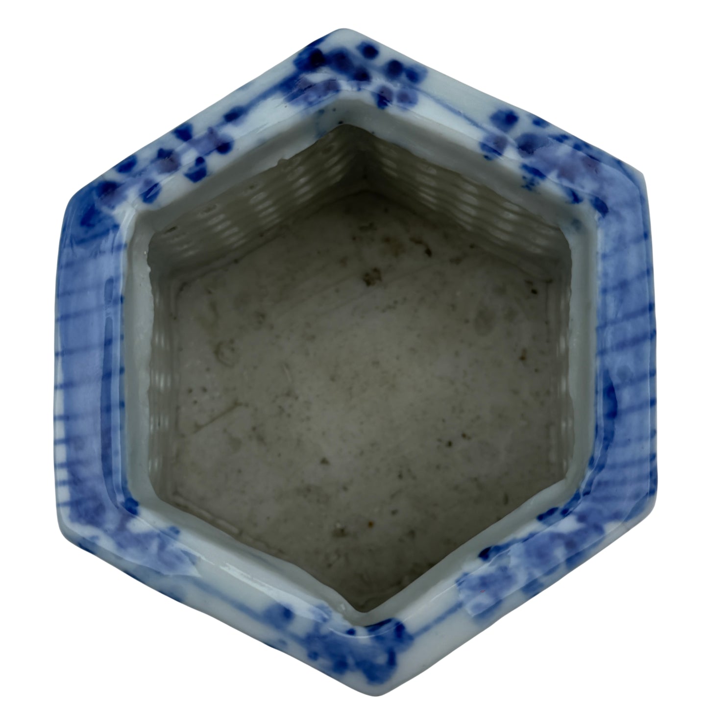 Side view of hexagonal pierced porcelain cachepot with bamboo motifs