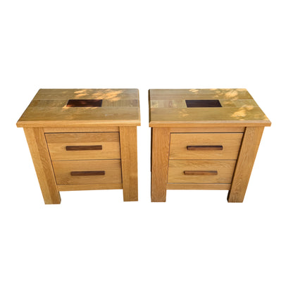 Close-up of oak drawer and darker wood handle on bedside cabinet
