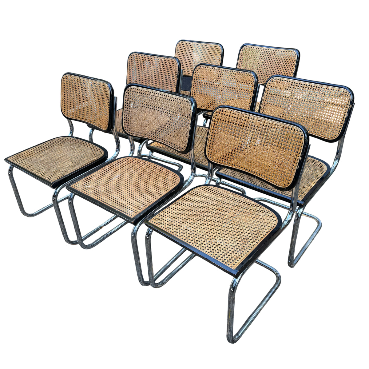 Set of eight Mid Century Arrben Italian cane cantilever dining chairs with chrome frames and black timber surrounds