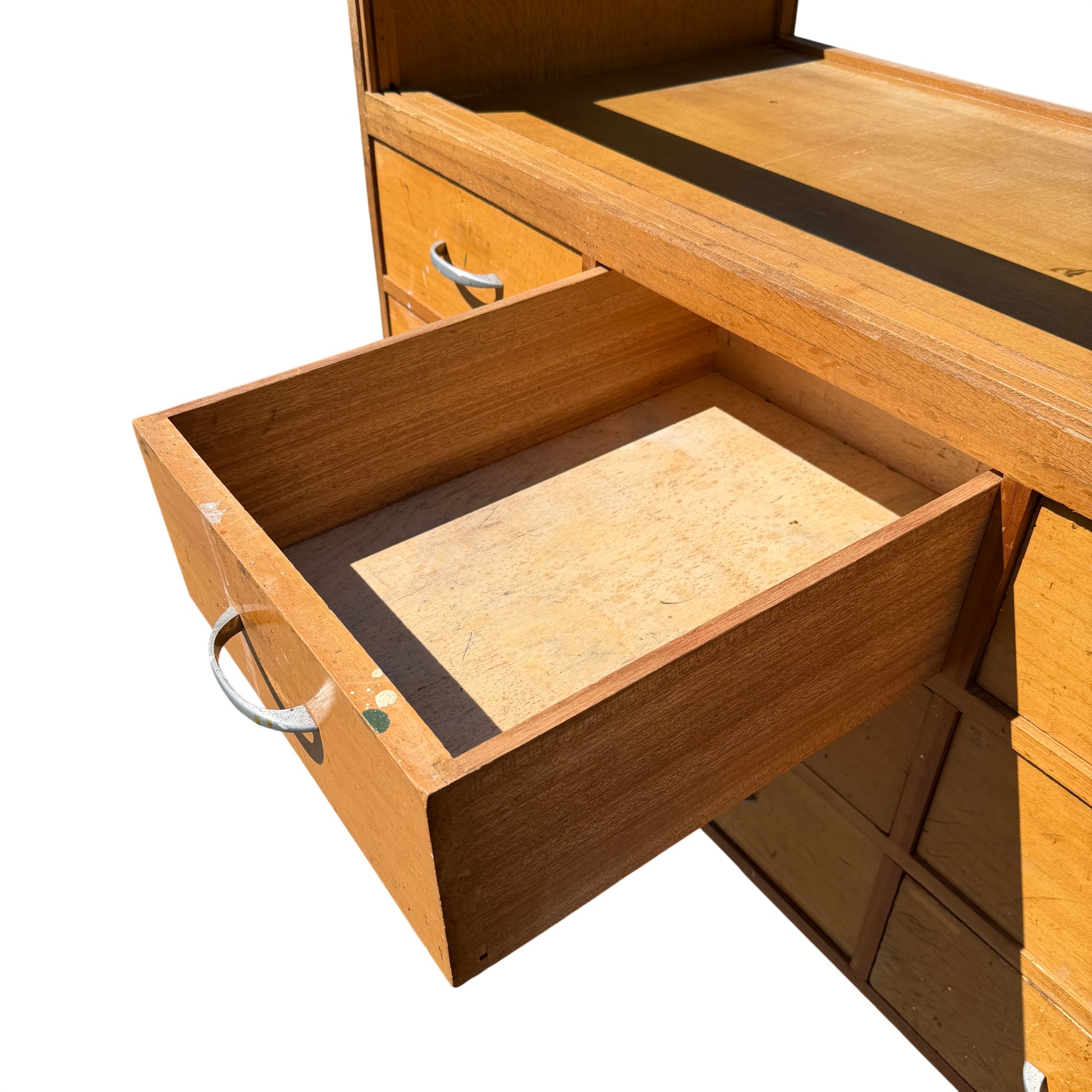 Detail of glazed display top with scratches and discolouration on timber frame