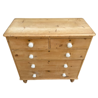 Rustic Victorian pine tallboy with turned feet and original key escutcheons