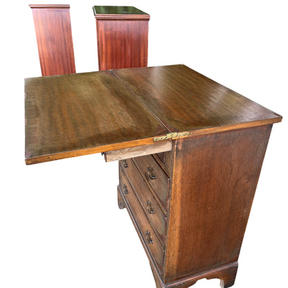 Side view of oak tallboy chest with bracket feet