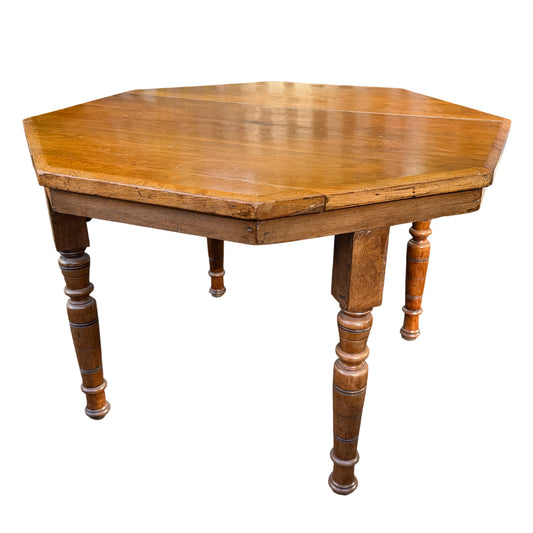 Victorian oak octagonal coffee table with turned spindle legs and warm honey finish