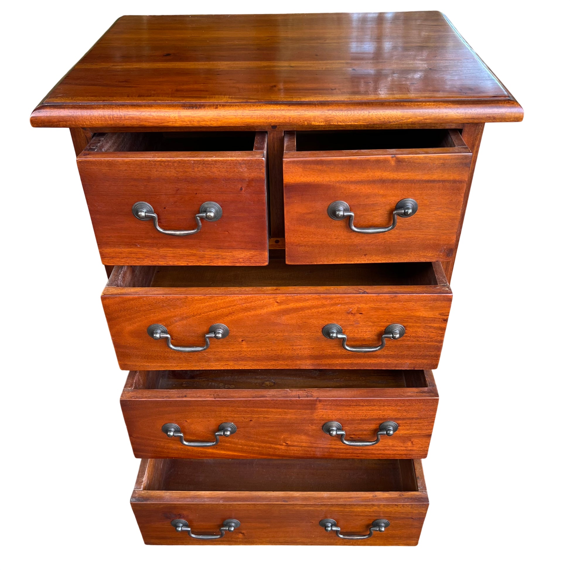 Lower drawers of stained hardwood chest with metal handles and dovetailed look fronts