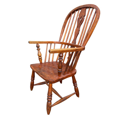 Top detail of Windsor-style oak armchair back with rounded crest rail