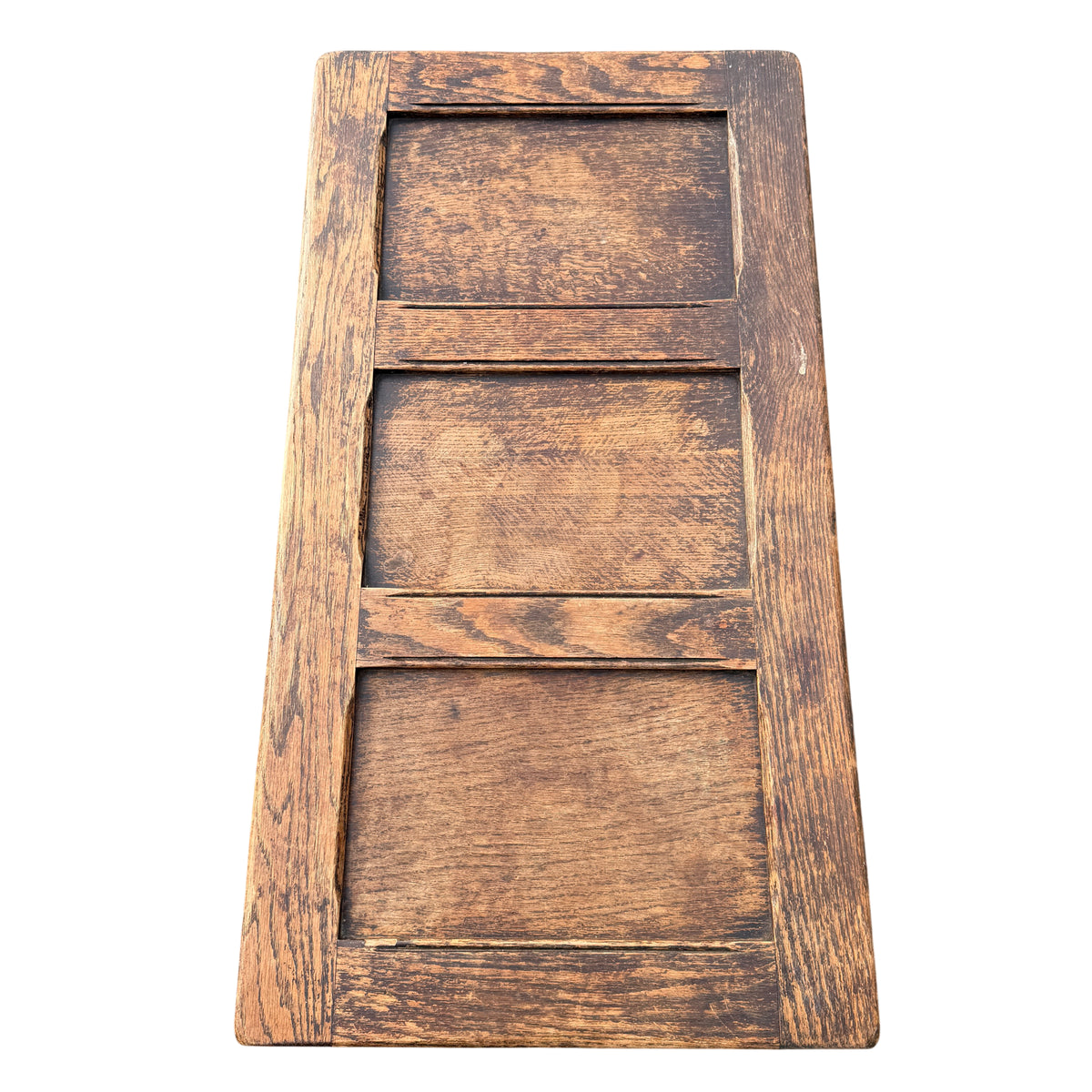 Corner detail of oak chest top with worn finish and edge moulding