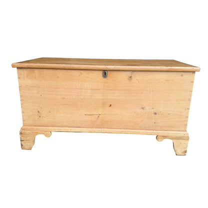 Front view vintage pine storage chest with brass keyhole escutcheon