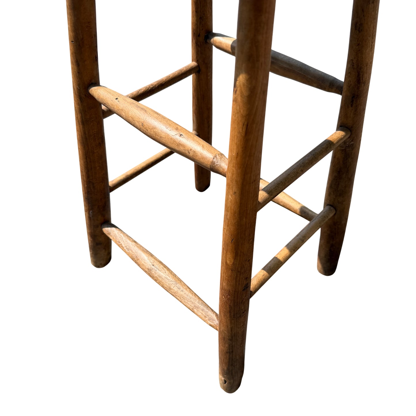 Rustic kitchen stool with carry slot and visible age-related scratches