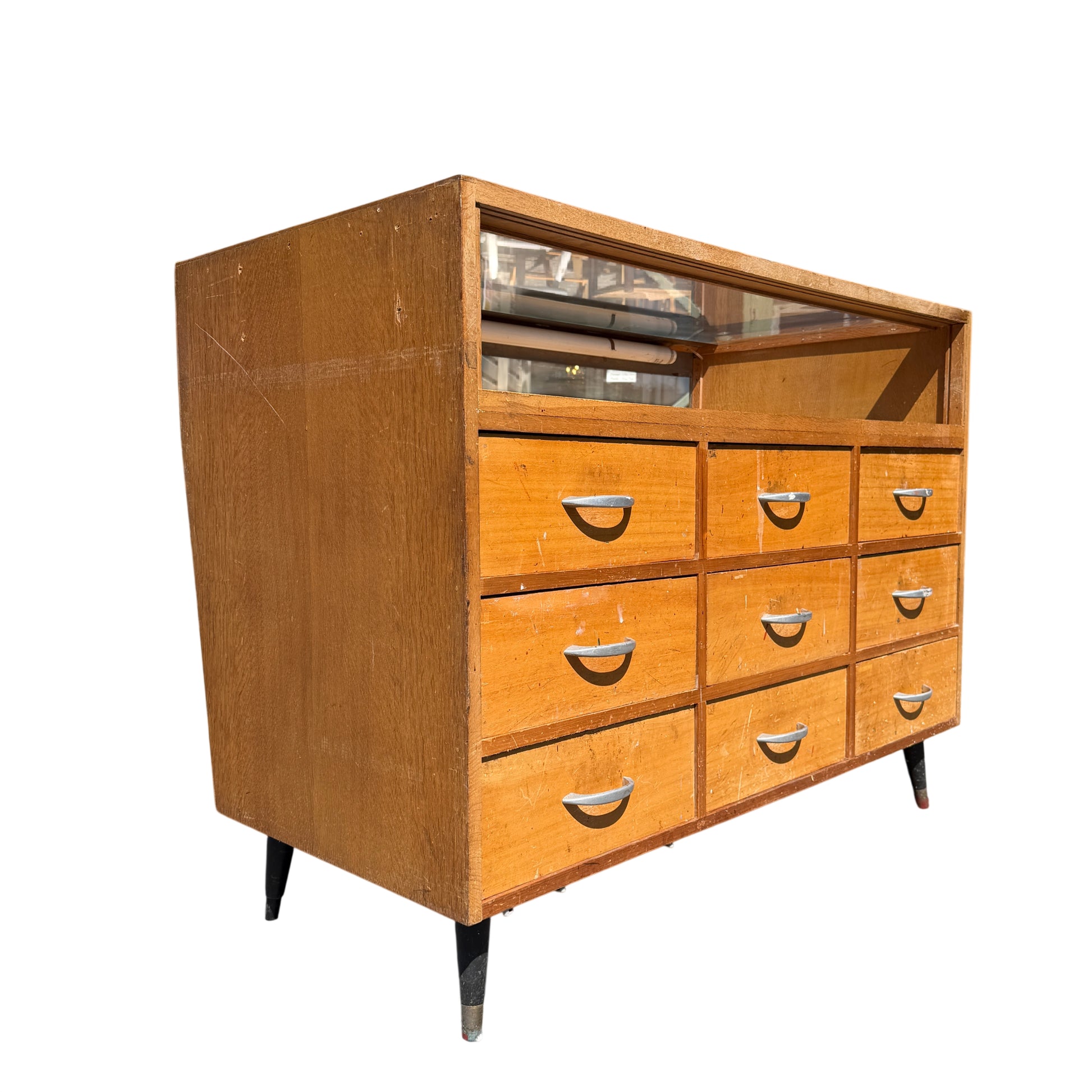 Mid Century shop counter display cabinet with glazed glass top and twelve drawers