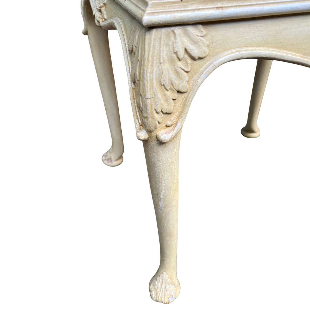 Lower apron with carved flower and claw style feet on vintage bedside chest